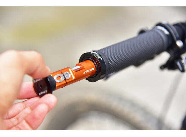 Granite Design Stash Chain Tool orange kjedekutter som lagres i styret 